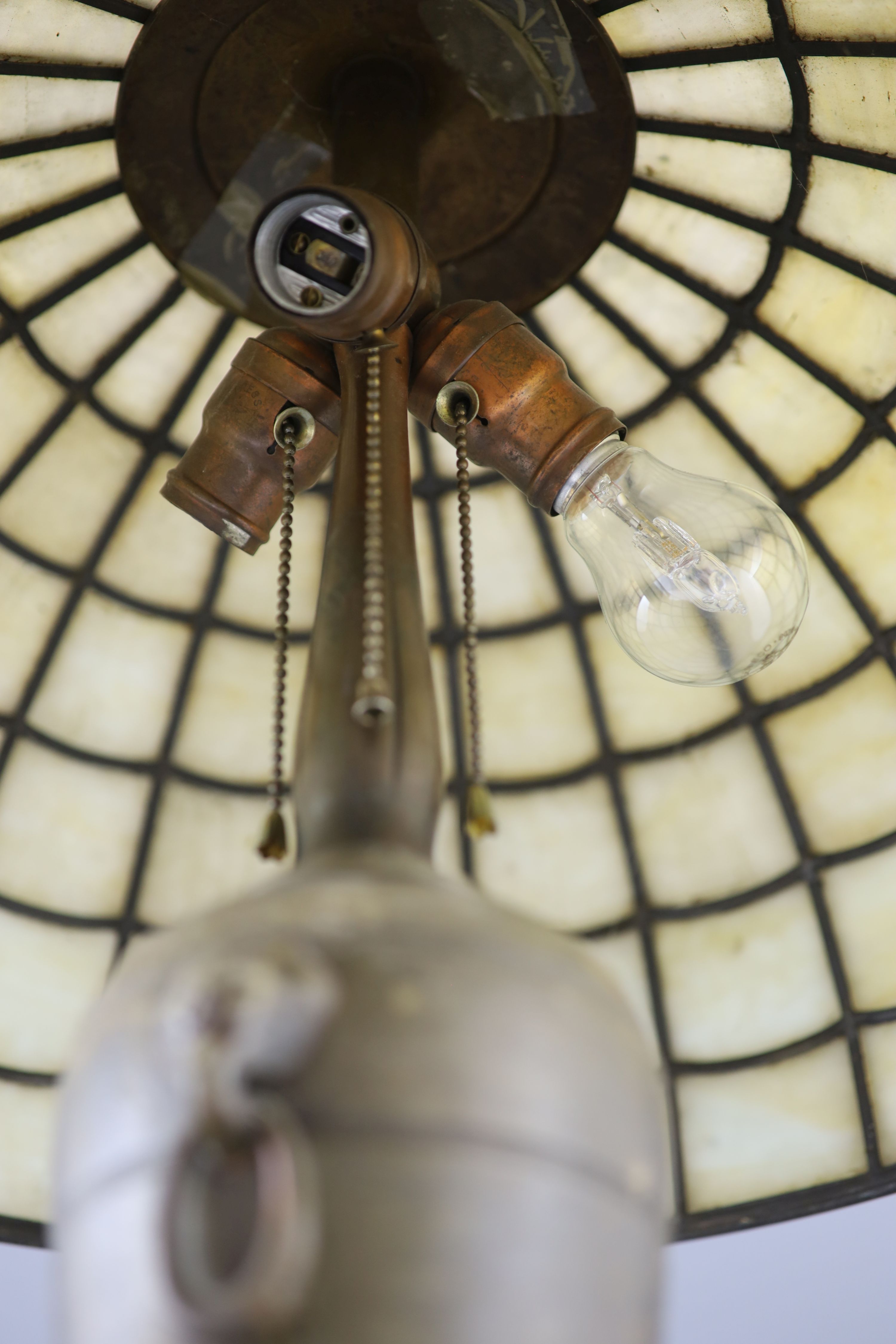 An early 20th century Tiffany style bronze table lamp, by Handel, diameter 20.1in. height 25in.